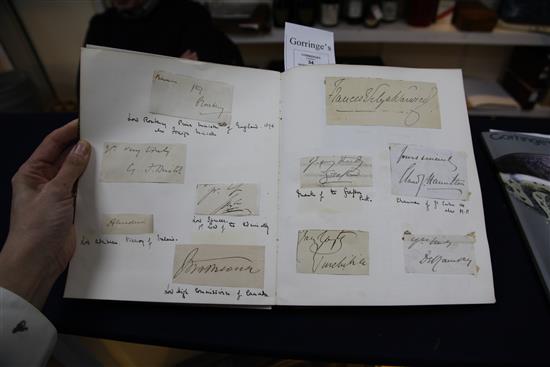 A 20th century autograph album, photo and a letter